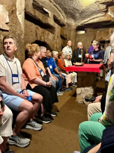 The group of university presidents toured the underground Catacombs of Domitilla.