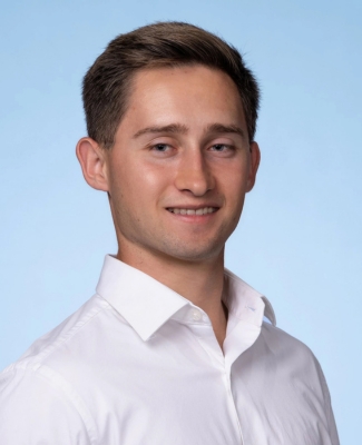 Huie, a two-time Newman grad, played soccer while earning his degrees
