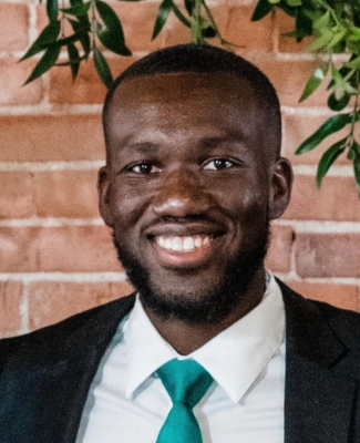 Olorunfemi was an assistant men's soccer coach at Newman University.
