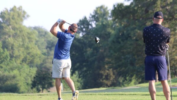 Golfers enjoy a day on the green during the 2025 Jet Open Charity Golf Tournament.