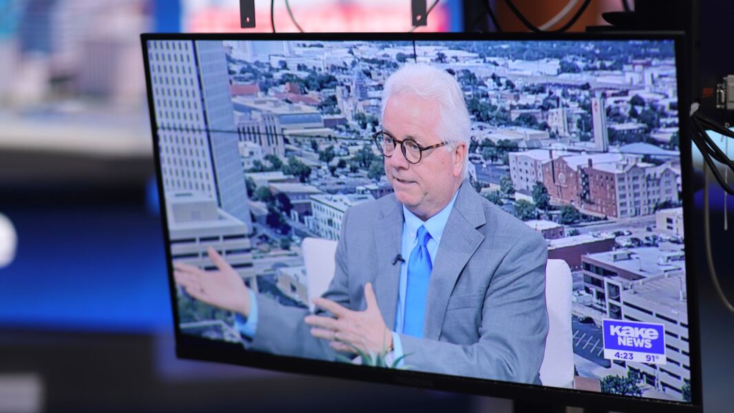 Straub appears on a TV behind-the-scenes during a KAKE News segment about data centers.