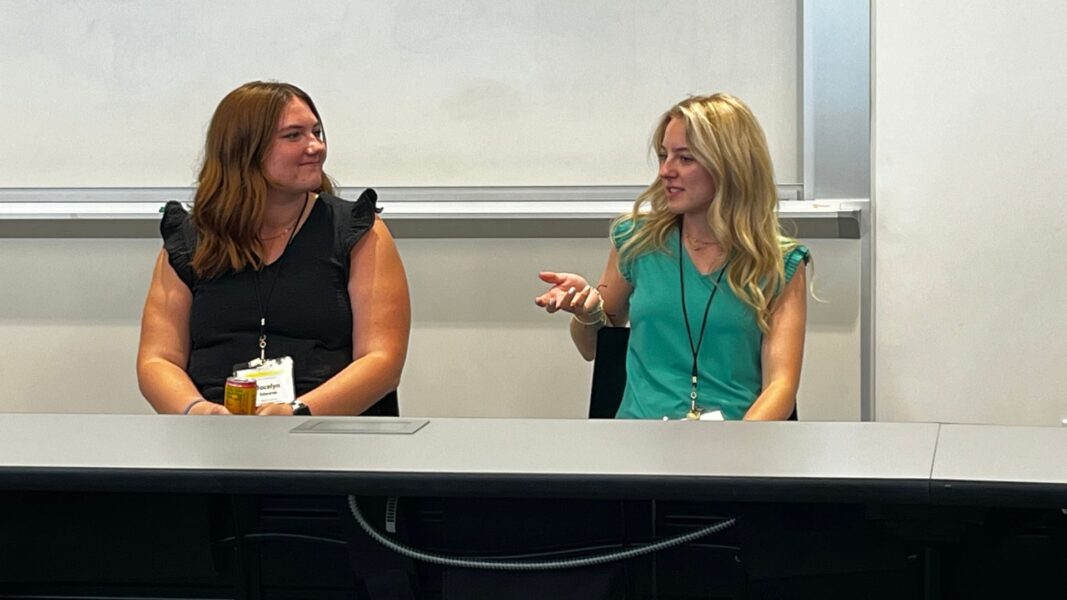 (Left to right) Edwards and Crumley served on a student panel during the conference.