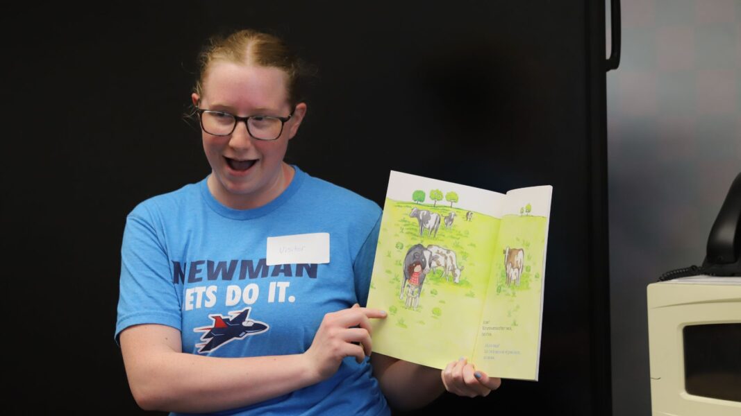 Real reads "How Do You Hug a Porcupine" by Laurie Isop to students at Stanley Elementary.
